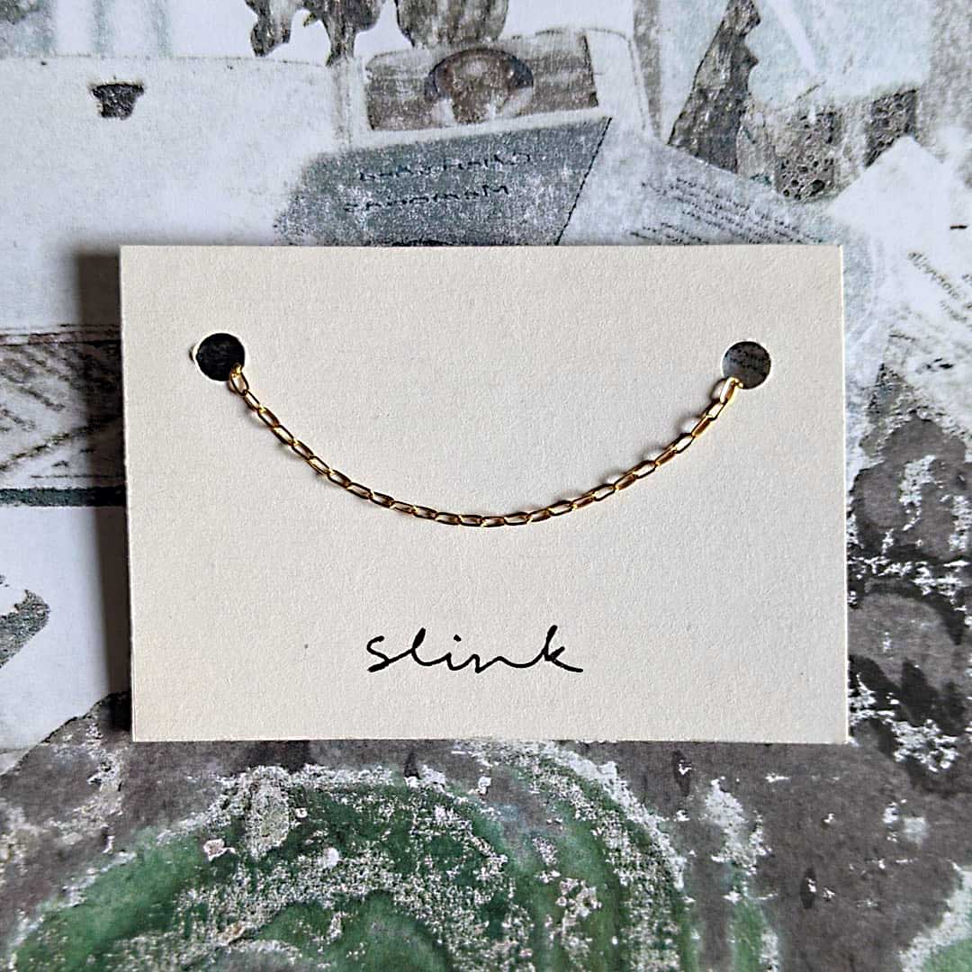 slink logo with chain on card